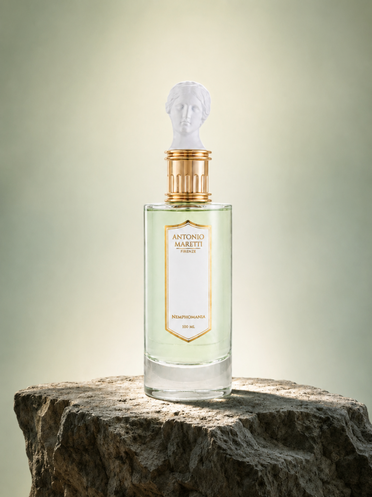 AM fragrance bottle standing on a sculptural stone cliff